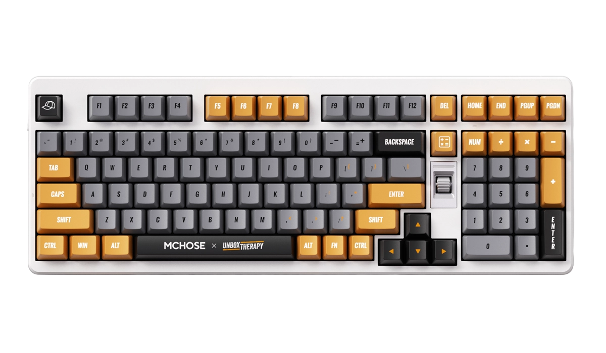 Klawiatura MCHOSE UT98 z szarymi i pomarańczowymi klawiszami oraz logo Unbox Therapy