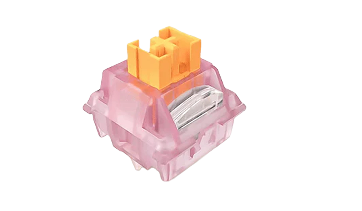 Przełącznik klawiatury mechanicznej w różowej obudowie z żółtym elementem na górze.